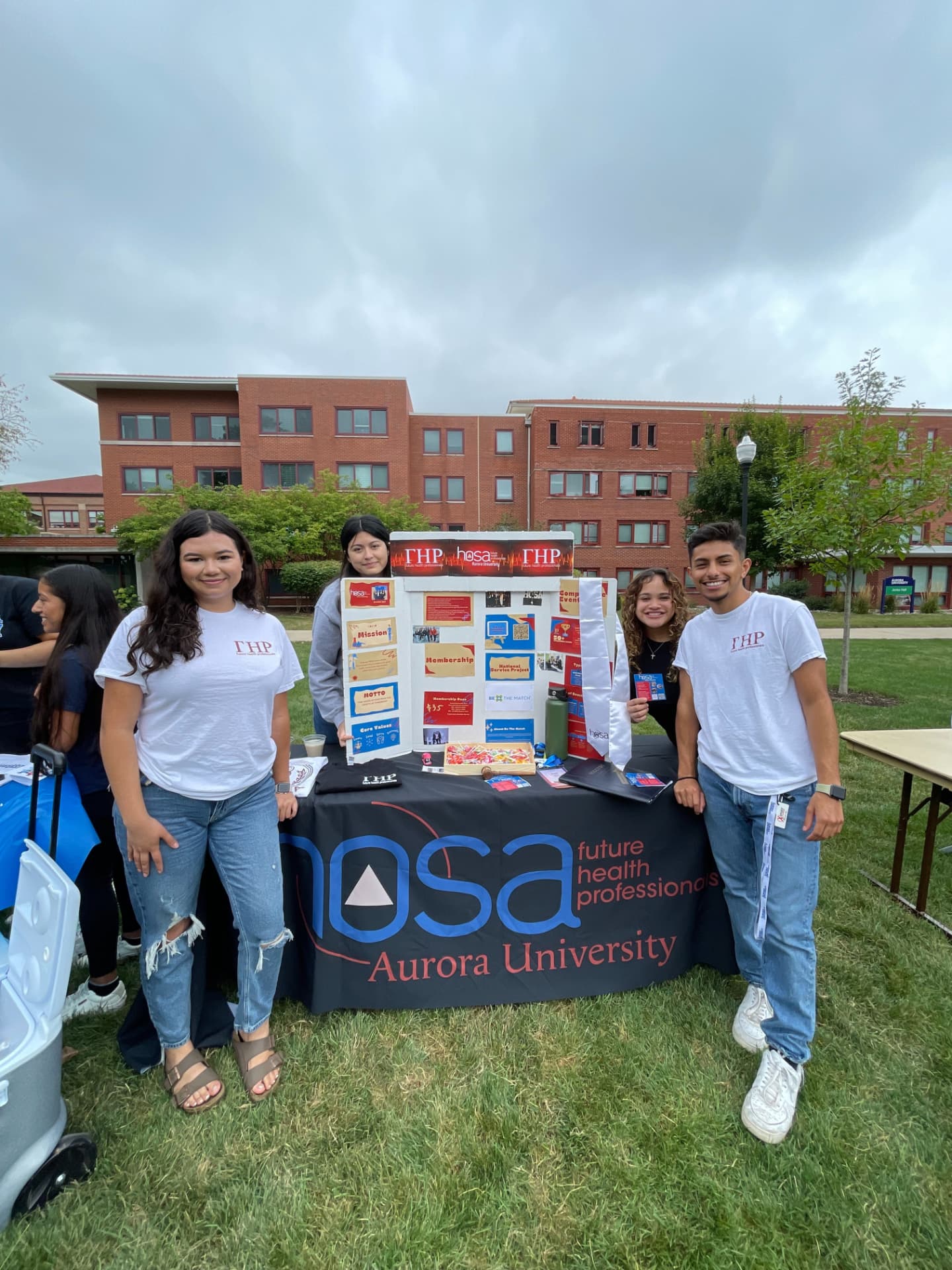 Chapter members staff an Illinois HOSA recruitment table at their school fair
